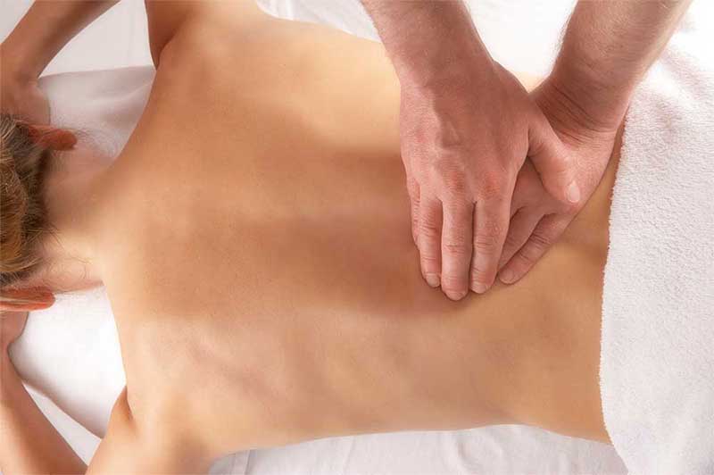 Massage av ländryggen